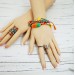 Friendship orange green beaded bracelet