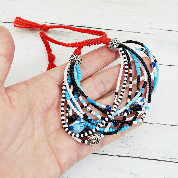 Beaded Multistrand Bracelet with Glass Beads and Buddha Charms