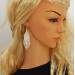 White beaded earrings with fringe